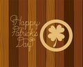 Saint patrick clover with hand made font wooden background