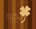 Saint patrick clover with hand made font wooden background