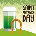 Saint patrick day green glass beer with horseshoe poster Royalty Free Stock Photo