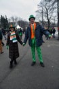 Saint Patrick`s Day celebration in Moscow. Men and women in carnival costumes