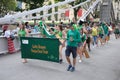 Saint Patrick`s Day Gaelic Dragon team crossing the Cavengah Bridge in Singapore