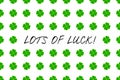 Saint Patrick`s Day greeting card with green mosaic clover leaves and text on white background. Inscription - LOTS OF LUCK! Royalty Free Stock Photo