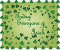 Saint Patrick's Day greeting card with sparkled green clover leaves and text. Inscription - Today Everyone Is Irish