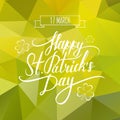 Saint Patrick's Day lettering sign on green abstract polygonal background. Royalty Free Stock Photo