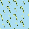 seamless blue pattern with candy canes. Background for wrapping paper, fabric print, greeting cards design.