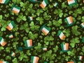 Saint Patrick`s Day seamless pattern. Clover and leprechaun hat with Irish flag. Festive background for advertising products, Royalty Free Stock Photo