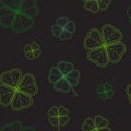 Saint Patrick`s Day seamless pattern with green tender clover leaves on black background.