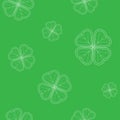 Saint Patrick`s Day seamless pattern with green tender clover leaves on white background.