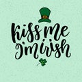 Saint Patricks Day greeting card with sparkled green clover leaves and text. Inscription - Kiss Me, I am Irish. St