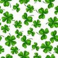Saint Patricks Day seamless pattern. Green clover shamrock and the four-leaf Royalty Free Stock Photo