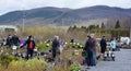 People relaxing and buying plants