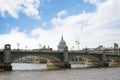 Saint pauls cathedral behind southwark Bridge