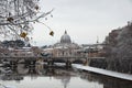 Saint Peter dome and Sant Angelo Bridge with snow Royalty Free Stock Photo