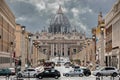 Rome, Italy. June 10, 2020: Saint Peter dome in the Vatican city in the historic center of Rome. Via della Concilizione with cars