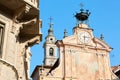 Saint Peter and Paul church clock and bell tower with automaton in a sunny summer day, blue sky Royalty Free Stock Photo