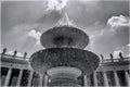 Saint Peter Square in Rome, Italy with the Bernini Fountain and Saint Peter Basilica Royalty Free Stock Photo