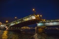 Saint Petersburg, bridging of bridge at night, drawbridge on Neva river at White nights Royalty Free Stock Photo