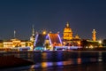 Saint Petersburg cityscape with open Palace bridge, St. Isaac`s cathedral, Admiralty building and Rostral column at night, Russia Royalty Free Stock Photo