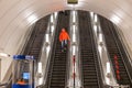 Saint-petersburg, Russia - 04 April 2020: An empty escalator moves through oval tube of light