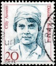 Saint Petersburg, Russia - April 21, 2020: Postage stamp issued in the Germany with a portrait of the Cilly Aussem, 1909-1963,