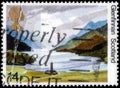 Saint Petersburg, Russia - April 01, 2020: Postage stamp issued in the United Kingdom with the image of the Glenfinnan, Scotland,