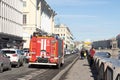 Saint-Petersburg, Russia - 10 April 2021: Red fire truck on the streets of the city goes to extinguish the fire, Illustrative Royalty Free Stock Photo