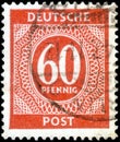 Saint Petersburg, Russia - April 14, 2020: Stamp issued in the Germany, Allied Occupation, with the image of Digits, American,