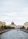 Saint-Petersburg, Russia, 22 August 2020: A pleasure boat sailing along Moyka River.