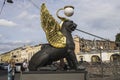 Sculptures of winged sphinxes on the Bank bridge in St. Petersburg, tourists, old buildings, Church of the Savior on spilled blood