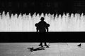 SAINT-PETERSBURG, RUSSIA. Black silhouette of a boy on a skateboard near Complex of singing fountains at Moscow Square