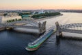 Saint Petersburg. Russia. Bolsheokhtinsky bridge lifted. Bridge of Peter the Great at sunset. The drawbridges of Petersburg. Royalty Free Stock Photo