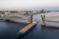 Saint Petersburg. Russia. Bolsheokhtinsky bridge lifted. Bridge of Peter the Great at sunset. The drawbridges of Petersburg. Royalty Free Stock Photo