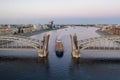 Saint Petersburg. Russia. Bolsheokhtinsky bridge lifted. Bridge of Peter the Great at sunset. The drawbridges of Petersburg. Royalty Free Stock Photo