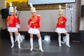 Saint Petersburg, Russia - December 15, 2017: Girls in red uniforms with drums dance.