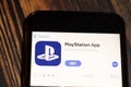 Saint-Petersburg, Russia - 25 December 2019: PlayStation App icon on App Store page close up top view on phone screen,