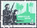 Saint Petersburg, Russia - December 08, 2019: Postage stamp issued in the People`s Republic of China depicting the Guerillas with