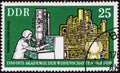 Saint Petersburg, Russia - December 19, 2019: Postage stamp issued in the German Democratic Republic with the image of Electron