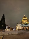 Early morning. Spruce decorated for Christmas and New Year in front of St. Isaac`s Cathedral in St. Petersburg