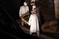 Egyptian people holding chariot wheel. Exhibition in the Peter and Paul Fortress