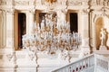 Saint Petersburg, Russia, 18.04.2019, exquisite chandelier and plaster moldings on main staircase of Yusupov Palace Royalty Free Stock Photo