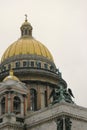 Saint Petersburg, Russia - Feb 26, 2016: Golden Dome with angel figureth of Saint Isaac`s Cathedral in front of the sky