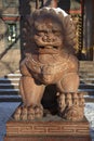 Sculpture of a guardian lion. Datsan Gunzechoyney, Saint Petersburg Royalty Free Stock Photo