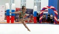 Adorable sporty little girl in rhythmic gymnastics