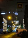 Gorokhovaya street, decorated with stars for Christmas and New Year, a view of the Admiralty of St. Petersburg