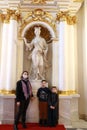 Mother with sons on the Jordan stairs in the State Hermitage