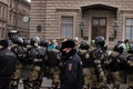 Saint Petersburg, Russia - 31 January 2021: Military force squad on street, police group in full armor with weapon, Illustrative