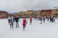 People skate at ice rink in New Holland park in the winter. Saint Petersburg. Russia Royalty Free Stock Photo