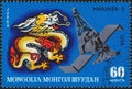 Saint Petersburg, Russia - January 03, 2020: Postage stamp issued in Mongolia with the image of the dragon and the Mariner 2 Royalty Free Stock Photo