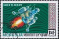 Saint Petersburg, Russia - January 03, 2020: Postage stamp issued in Mongolia with the image of the flight of the Luna 16