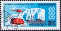Saint Petersburg, Russia - January 08, 2020: Postage stamp issued in Mongolia with the image of the Helicopter, ship, all-terrain